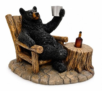 Black Bear Relaxing on Chair